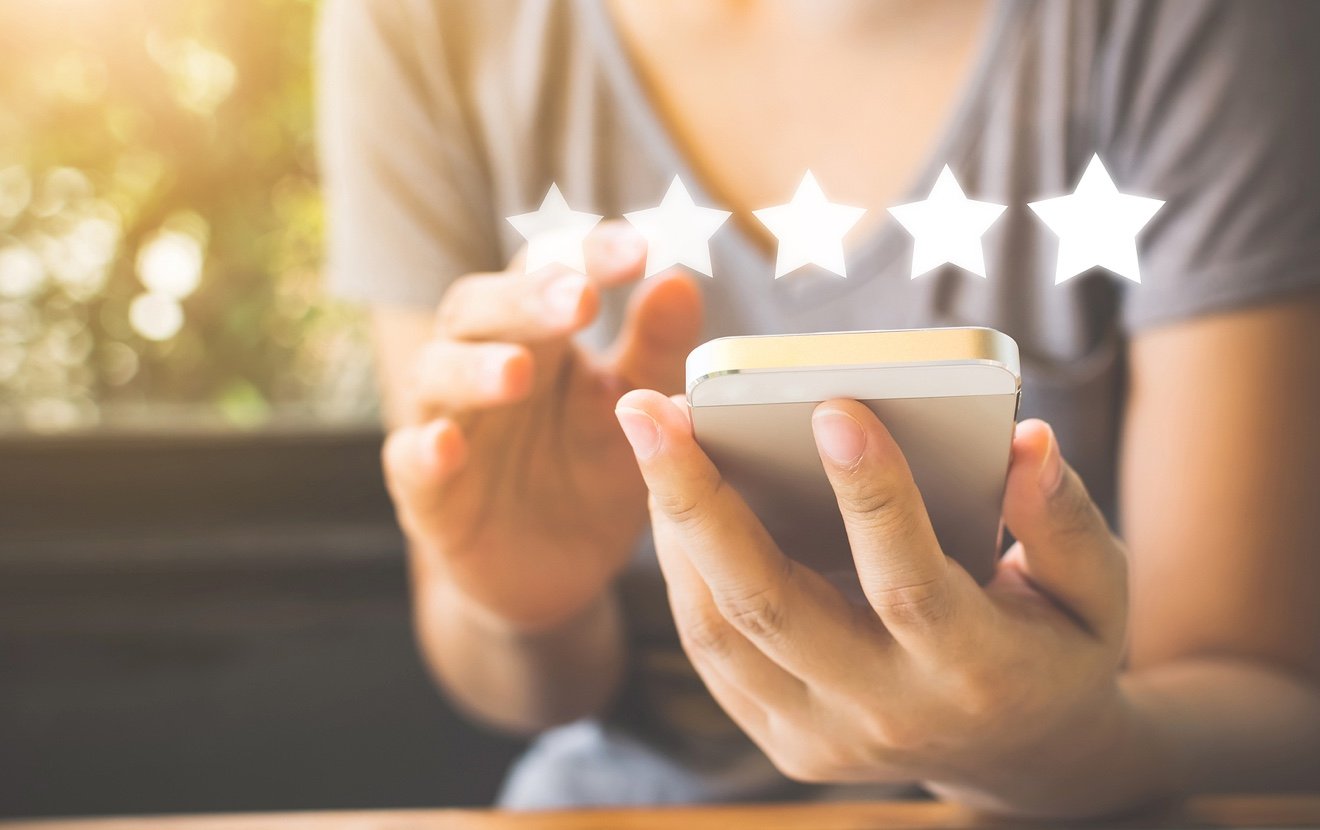 Customer Service Experience And Business Satisfaction Survey. Woman Hand Using Smart Phone With Icon
