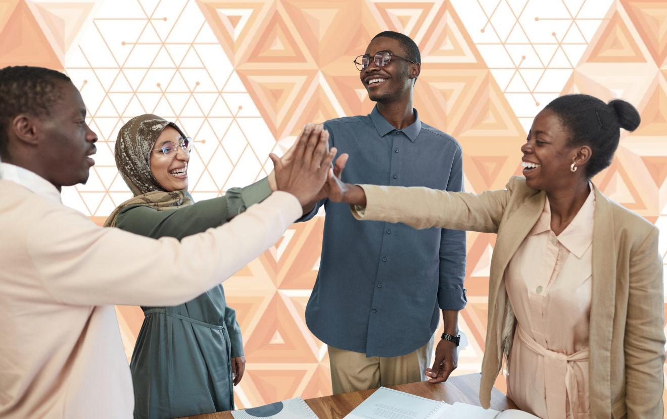 Two men and two women high-fiving